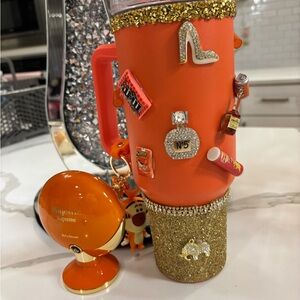 Orange Tumbler with Gold Accents and Charms and majestic supreme perfume